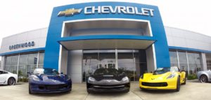 Front of Greenwood Chevrolet Dealership with Three Corvettes